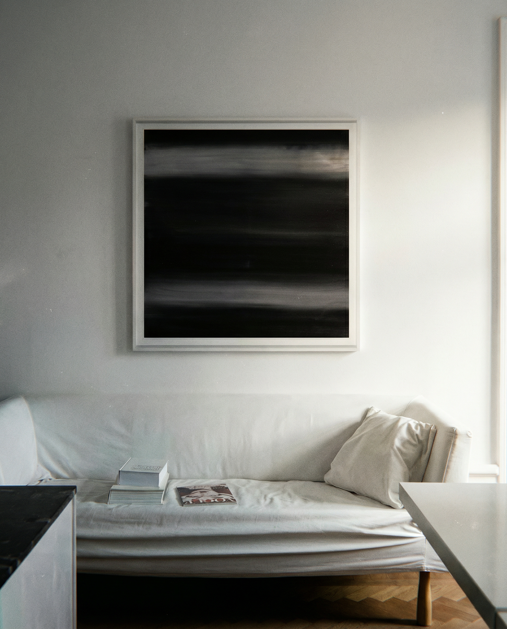 Framed abstract artwork on a white wall above a sofa in a living room. Horizon 2 – Bold Abstract Canvas Wall Art | Premium Luxury Print | Brume Art