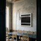Dining room with a long table and chairs, featuring a modern painting on the wall. Horizon 2 – Bold Abstract Canvas Wall Art | Premium Luxury Print | Brume Art