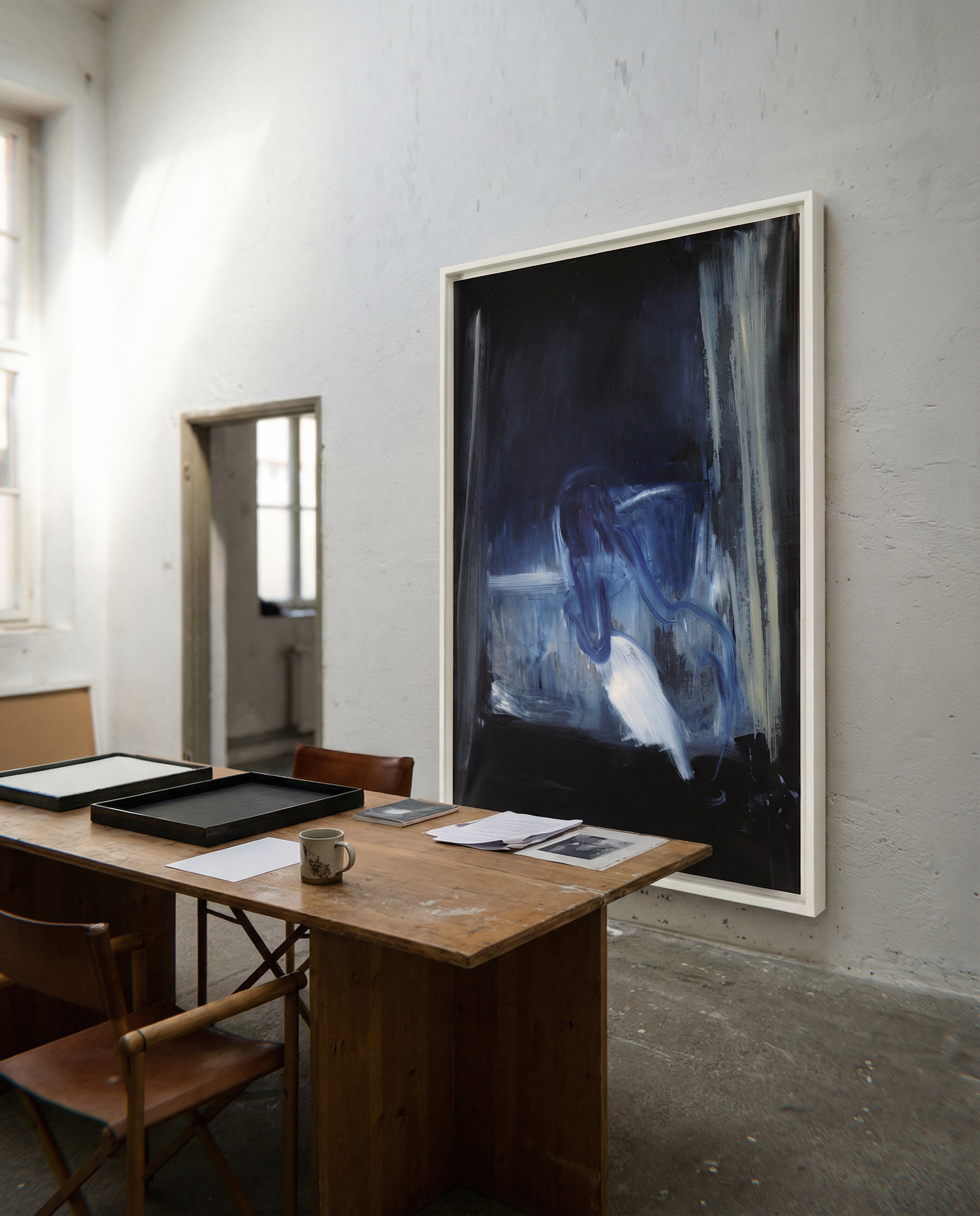 Room with a wooden desk, chairs, and a large abstract painting on the wall. Field black – Landscape Canvas Wall Art | Large Luxury Print | Brume Art