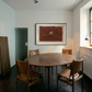 Dining room with wooden table and chairs, framed artwork on the wall. silent run – Contemporary Animal Canvas Art | Luxury Wall Decor | Brume Art