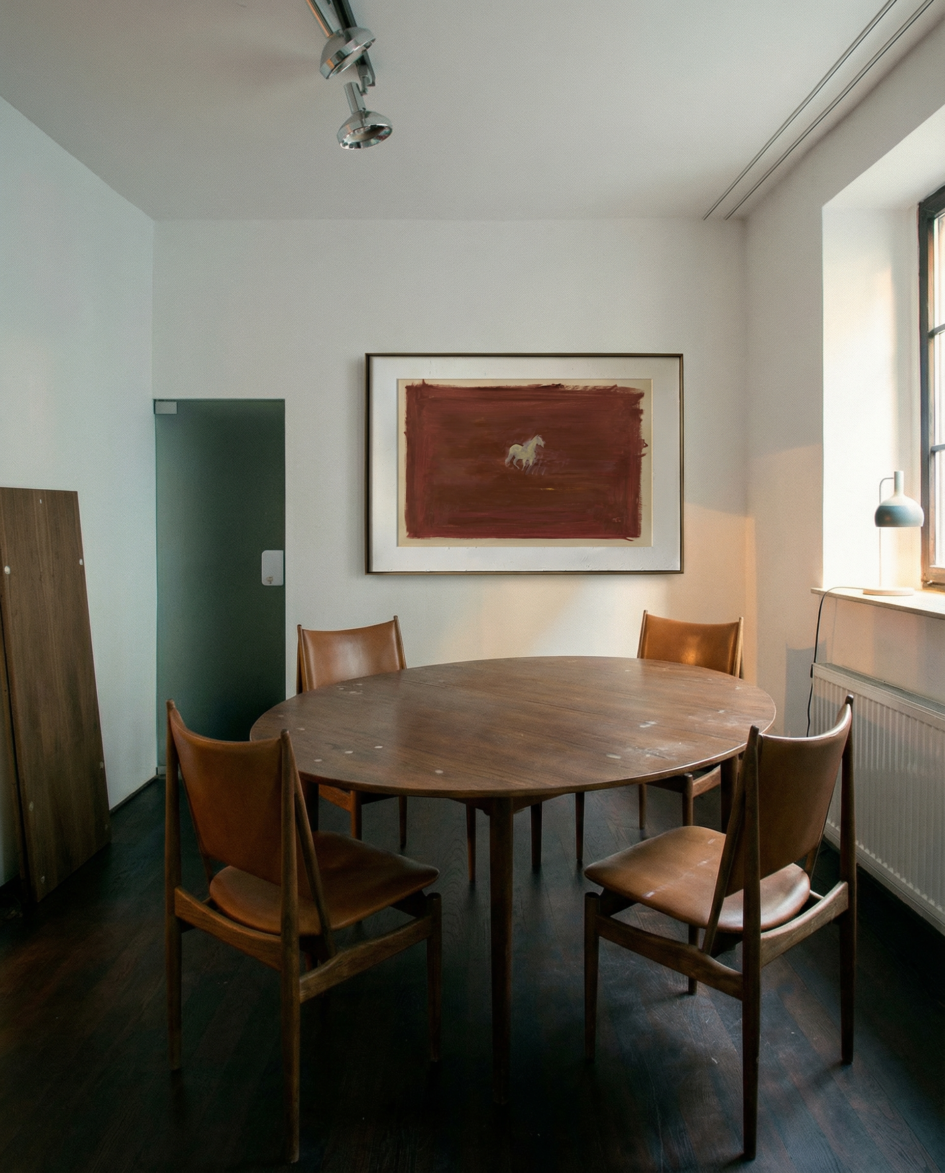 Dining room with wooden table and chairs, framed artwork on the wall. silent run – Contemporary Animal Canvas Art | Luxury Wall Decor | Brume Art