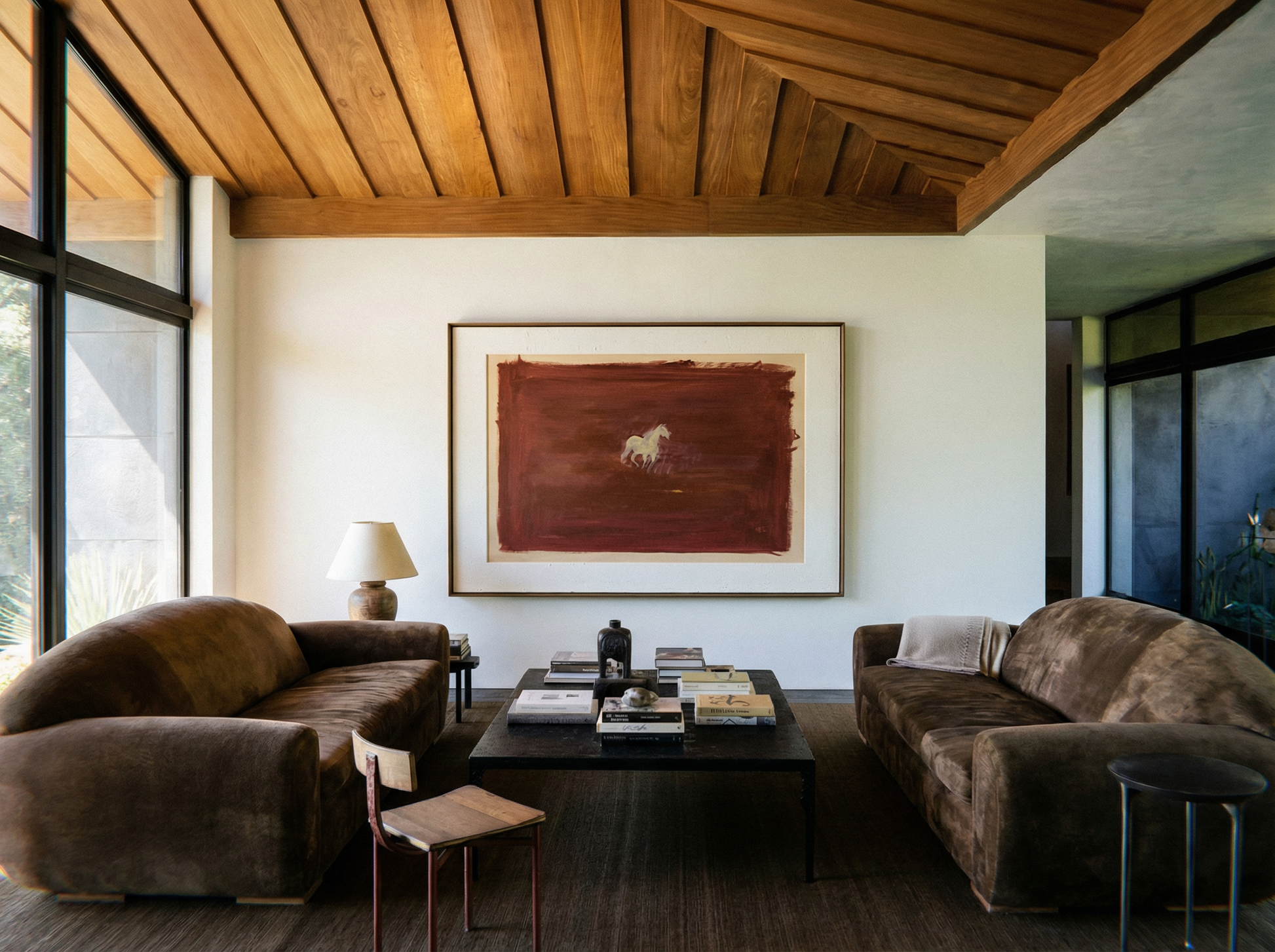 Modern living room with brown sofas, a coffee table, and a large abstract painting on the wall. silent run – Contemporary Animal Canvas Art | Luxury Wall Decor | Brume Art