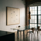 Modern dining room with a large abstract painting on the wall and a glass dining table.  Birds – Nature Canvas Wall Art | Large Luxury Print | Brume Art
