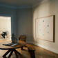 Modern interior with a wooden table, chair, and abstract art on the wall.  Birds – Nature Canvas Wall Art | Large Luxury Print | Brume Art