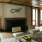 Modern living room with wooden ceiling, fireplace, and minimal decor. Green Snake – Nature Canvas Wall Art | Large Luxury Print | Brume Art