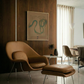 Brown chair and ottoman in a modern living room with a wooden wall and abstract art. Snake 2 – Nature Canvas Wall Art | Premium Luxury Print | Brume Art