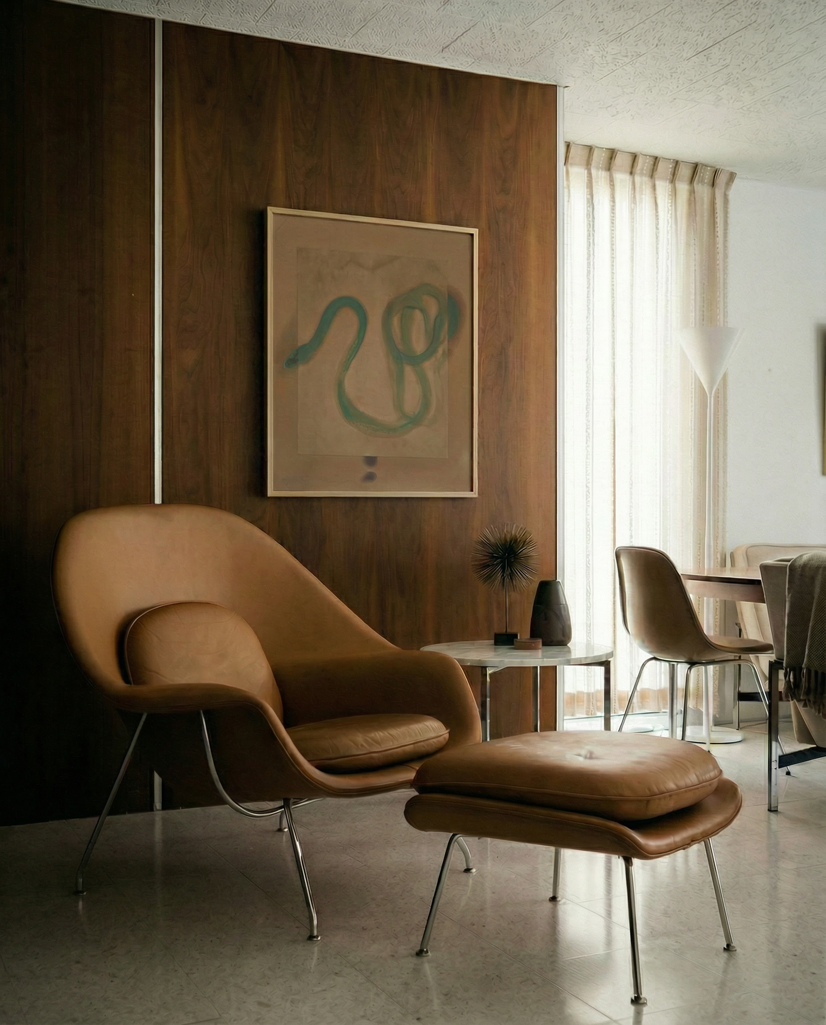 Brown chair and ottoman in a modern living room with a wooden wall and abstract art. Snake 2 – Nature Canvas Wall Art | Premium Luxury Print | Brume Art