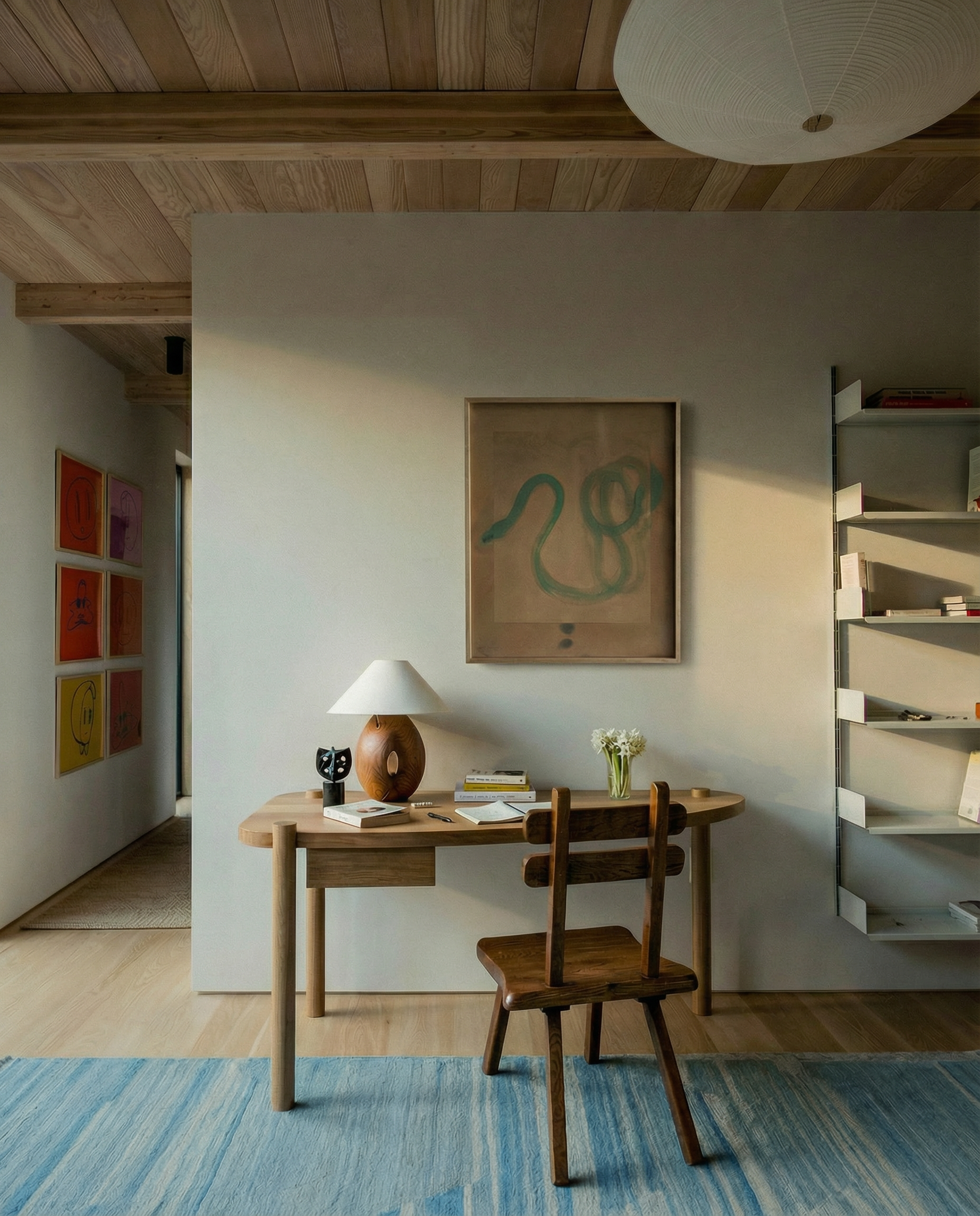 Home office with wooden desk, chair, and wall art in a modern interior. Snake 2 – Nature Canvas Wall Art | Premium Luxury Print | Brume Art