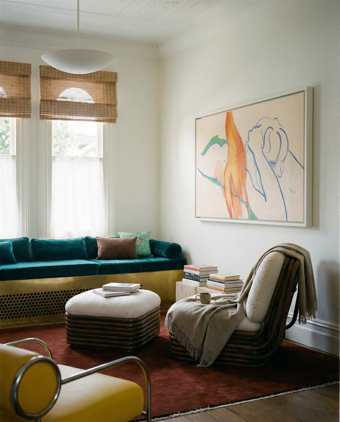 Modern living room with teal sofa, white ottoman, and abstract art on the wall. Figure and Flame – Figurative Canvas Wall Art | Premium Luxury Print | Brume Art