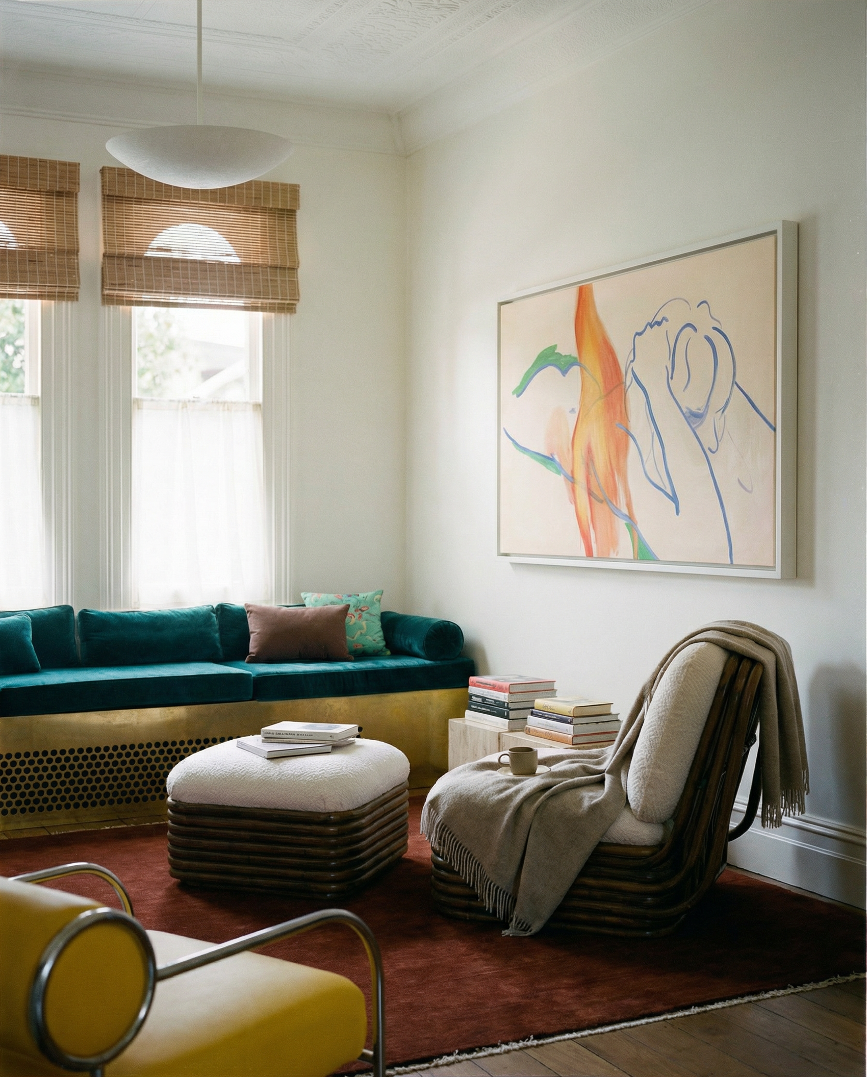 Modern living room with teal sofa, white ottoman, and abstract art on the wall. Figure and Flame – Figurative Canvas Wall Art | Premium Luxury Print | Brume Art