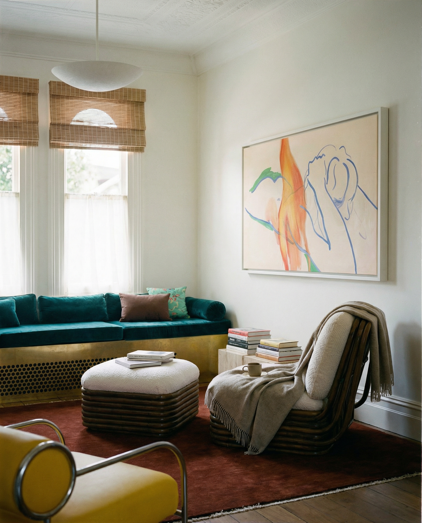 Modern living room with teal sofa, white ottoman, and abstract art on the wall. Figure and Flame – Figurative Canvas Wall Art | Premium Luxury Print | Brume Art