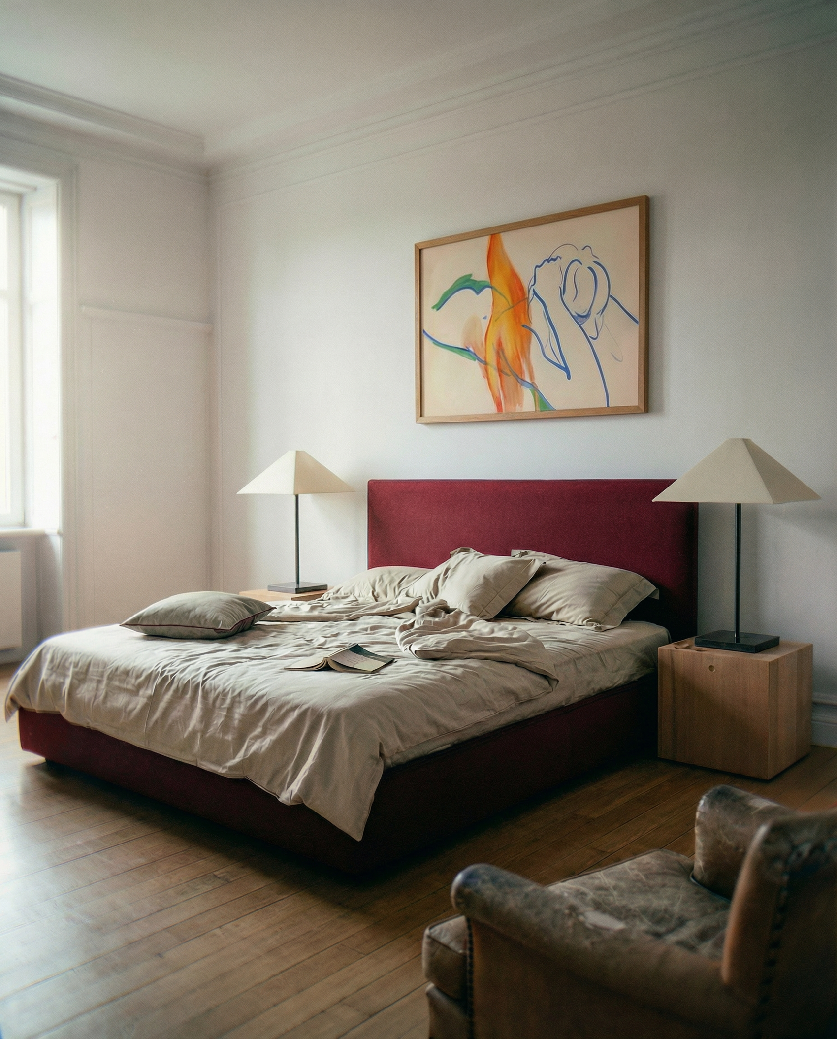 Modern bedroom with a bed, lamps, and abstract art on the wall. Figure and Flame – Figurative Canvas Wall Art | Premium Luxury Print | Brume Art