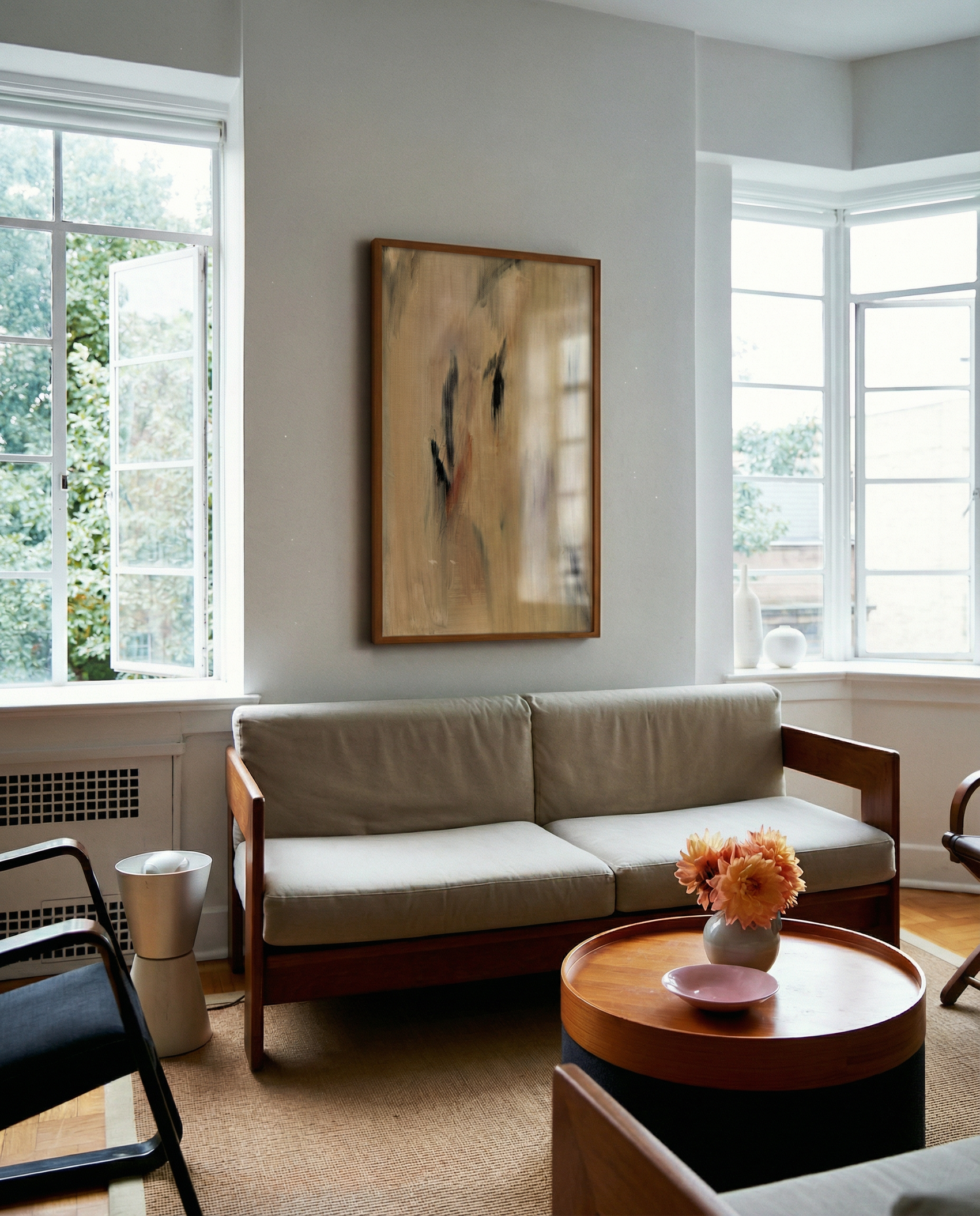 Living room with a beige sofa, wooden coffee table, and abstract painting on the wall. Abstract painting with brown and black brush strokes on a beige background Field Yellow 2 – Landscape Canvas Wall Art | Premium Luxury Print | Brume Art