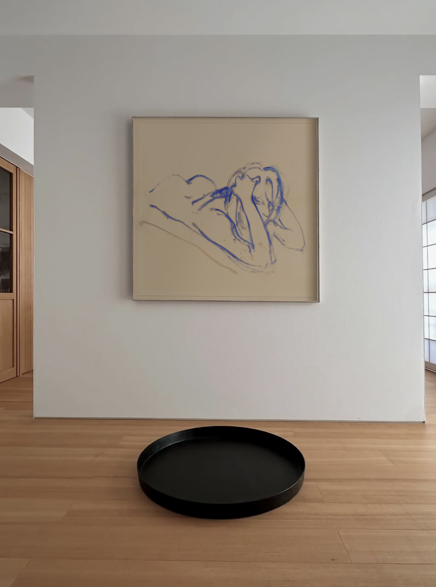 Framed abstract artwork on a wall with a black round tray on the floor in front. Presence 3 – Figurative Abstract Canvas | Premium Wall Art | Brume Art | Luxury Wall Decor | Large Canvas Wall Art | Oversized Wall Hanging-Brume art