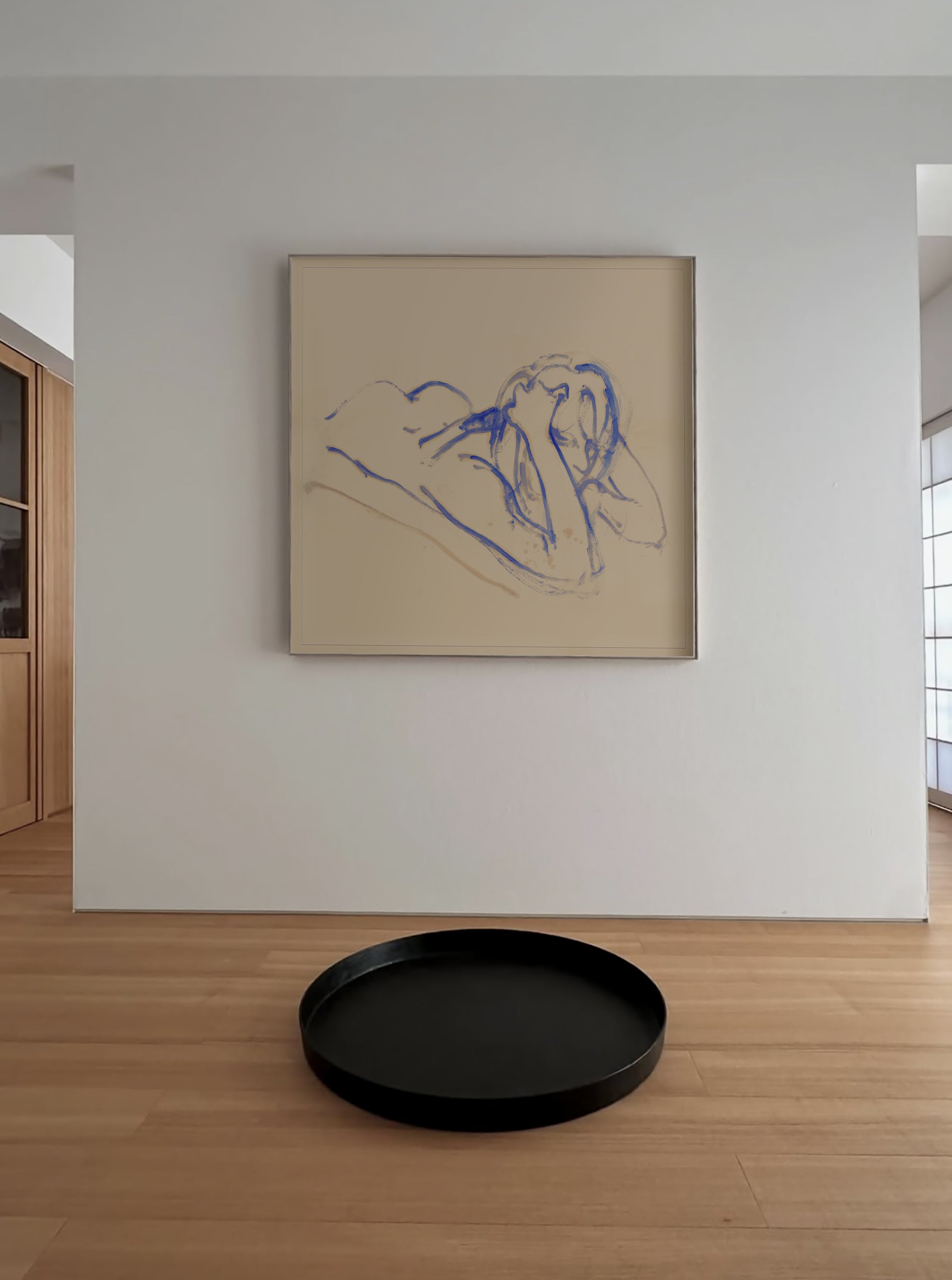 Framed abstract artwork on a wall with a black round tray on the floor in front. Presence 3 – Figurative Abstract Canvas | Premium Wall Art | Brume Art | Luxury Wall Decor | Large Canvas Wall Art | Oversized Wall Hanging-Brume art