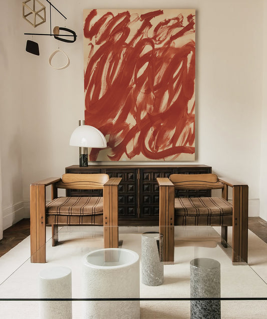 Modern interior with abstract red painting, wooden chairs, and glass coffee table. Noise 6 – Textured Abstract Canvas Art | Premium Luxury Wall Decor | Brume Art