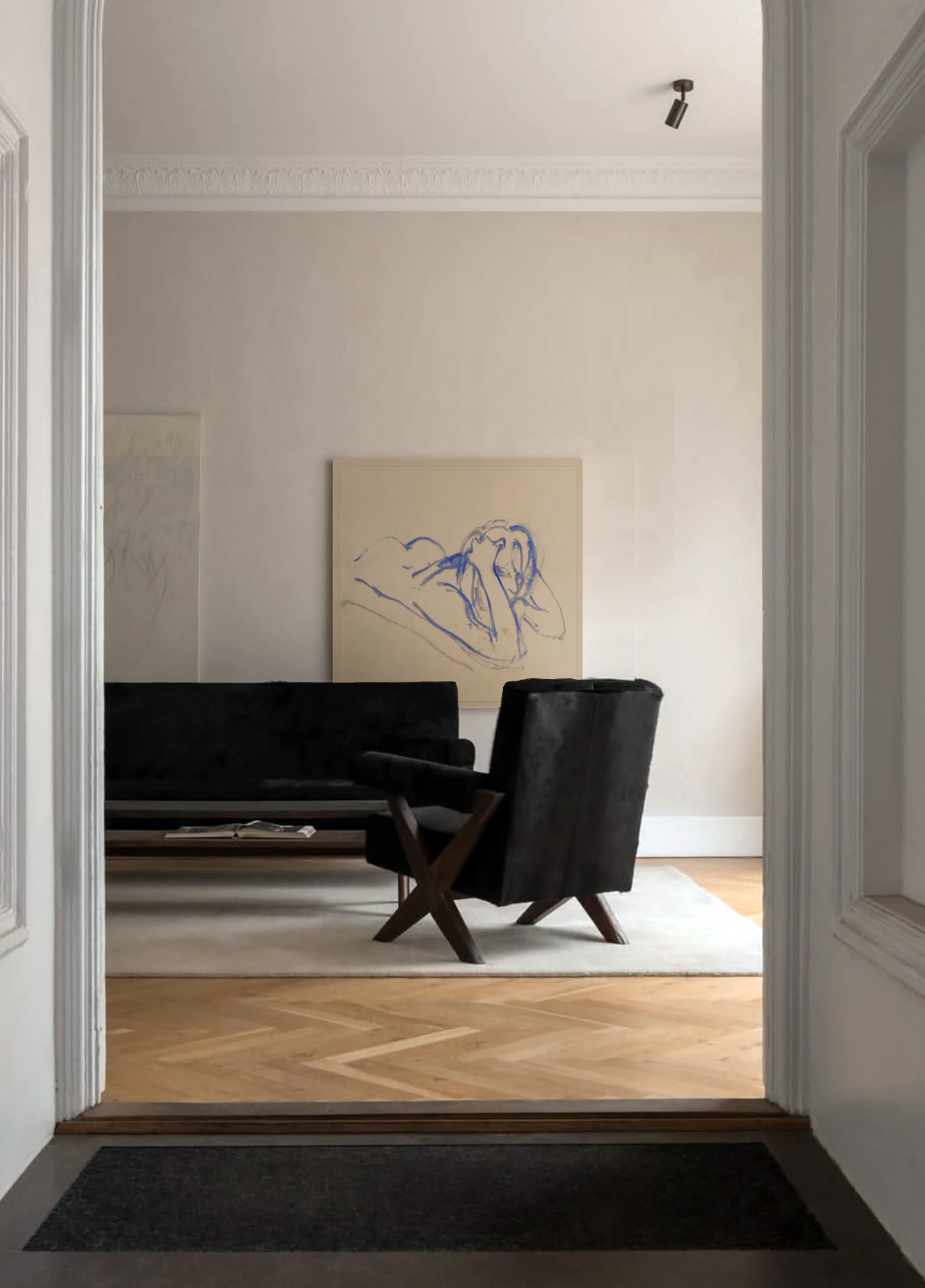 Modern living room with black sofa and chair, artwork on the wall. Presence 3 – Figurative Abstract Canvas | Premium Wall Art | Brume Art | Luxury Wall Decor | Large Canvas Wall Art | Oversized Wall Hanging-Brume art