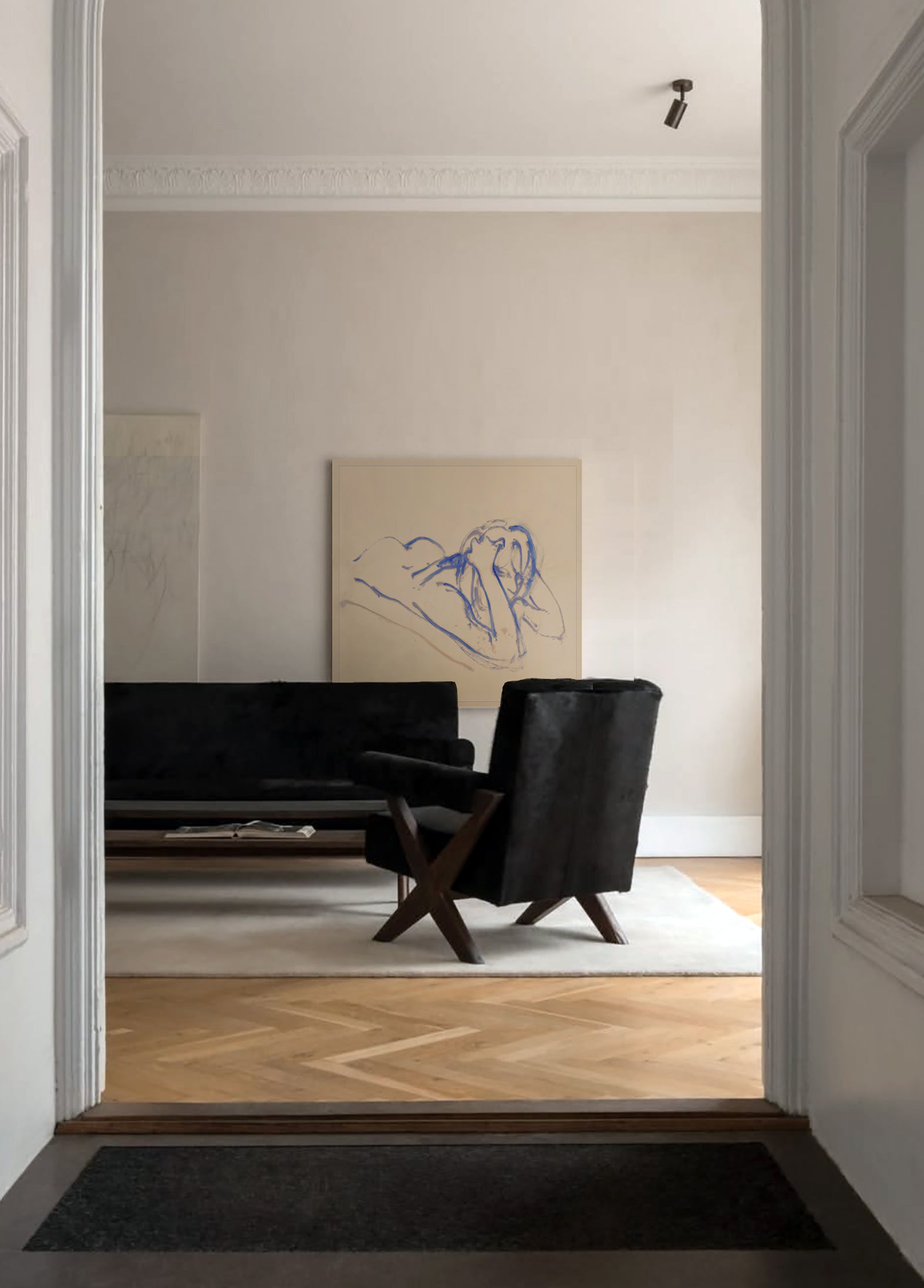 Modern living room with black sofa and chair, artwork on the wall. Presence 3 – Figurative Abstract Canvas | Premium Wall Art | Brume Art | Luxury Wall Decor | Large Canvas Wall Art | Oversized Wall Hanging-Brume art