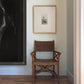 Wicker chair in a room with framed artwork on the wall Seaside retreat Contemporary Sketch Canvas Art | Luxury Wall Decor | Brume Art|