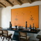 Dining room with wooden table and chairs, orange abstract wall art, and decorative items. Marks – Bold Abstract Canvas Wall Art | Premium Luxury Print | Brume Art