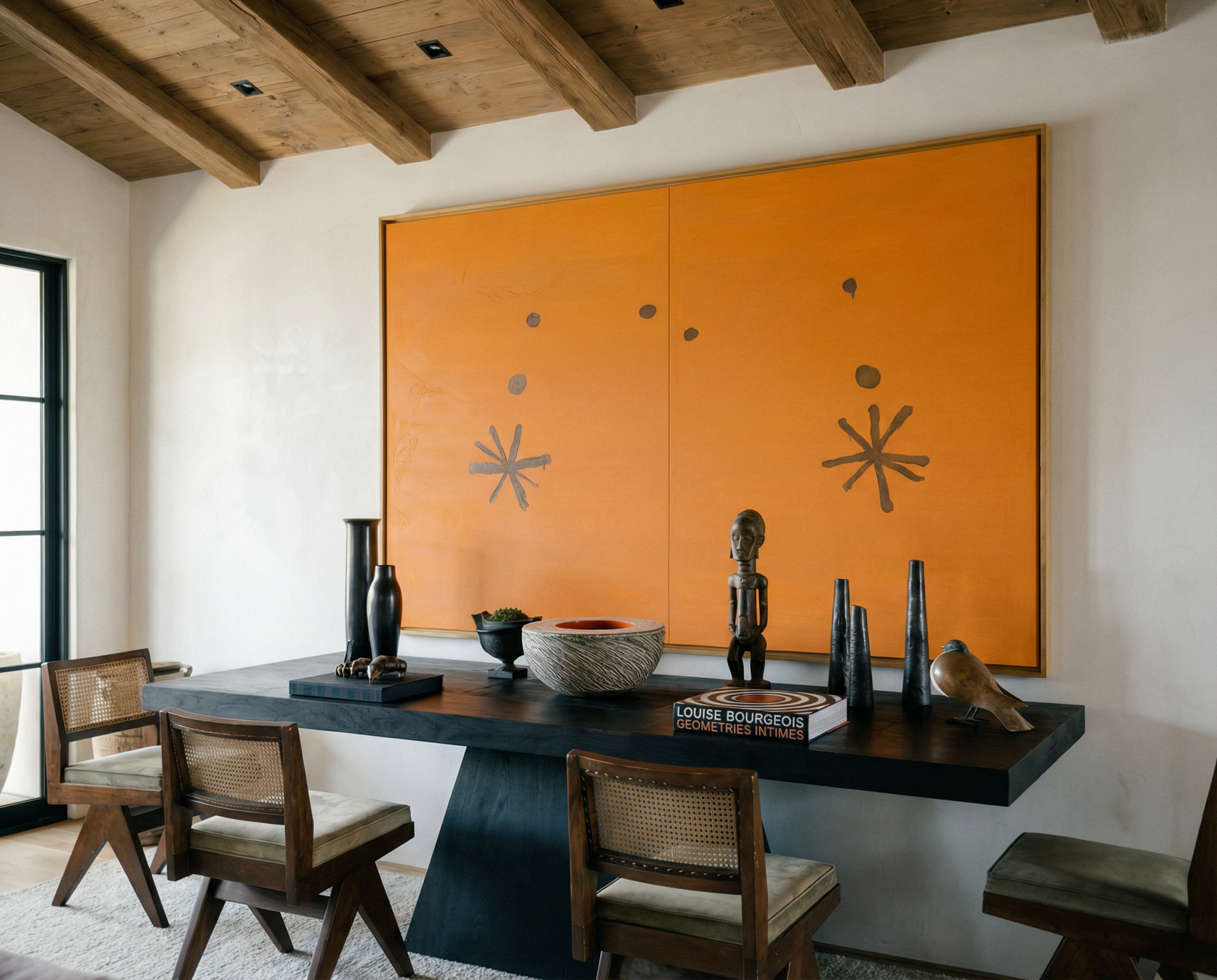 Dining room with wooden table and chairs, orange abstract wall art, and decorative items. Marks – Bold Abstract Canvas Wall Art | Premium Luxury Print | Brume Art