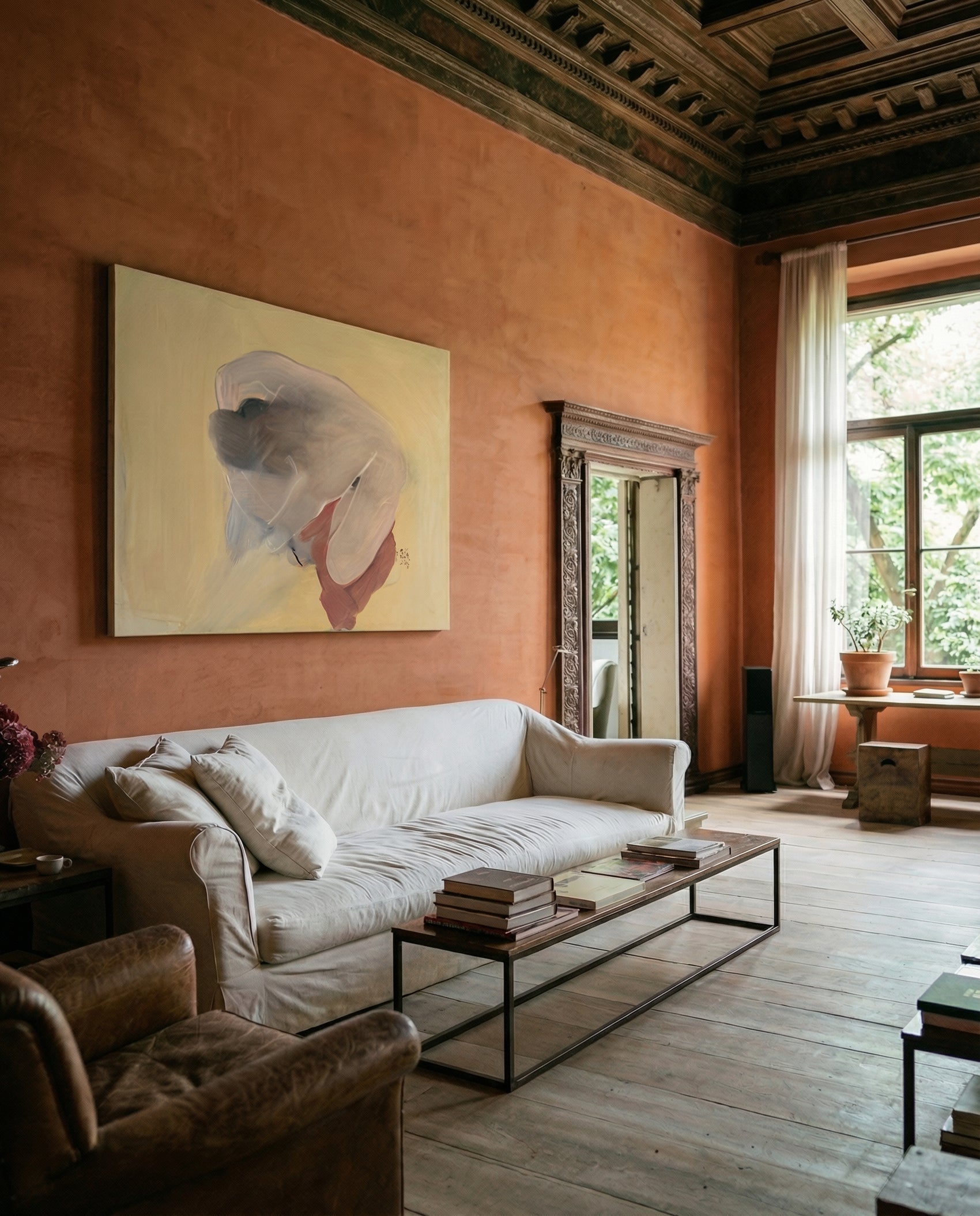 Living room with a white sofa, wooden coffee table, and a large painting on an orange wall. Soft Body – Figurative Abstract Canvas Print | Premium Wall Art | Brume Art