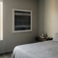 Modern bedroom with a bed, nightstand, and framed artwork on the wall. Horizon 2 – Bold Abstract Canvas Wall Art | Premium Luxury Print | Brume Art