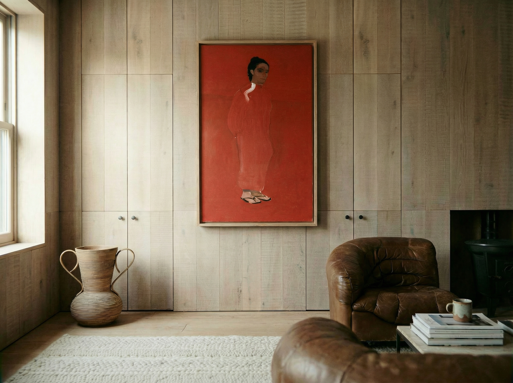 Living room with wooden walls, a brown armchair, and a red painting of a woman. The Woman in Red – Portrait Canvas Wall Art | Large Luxury Print | Brume Art