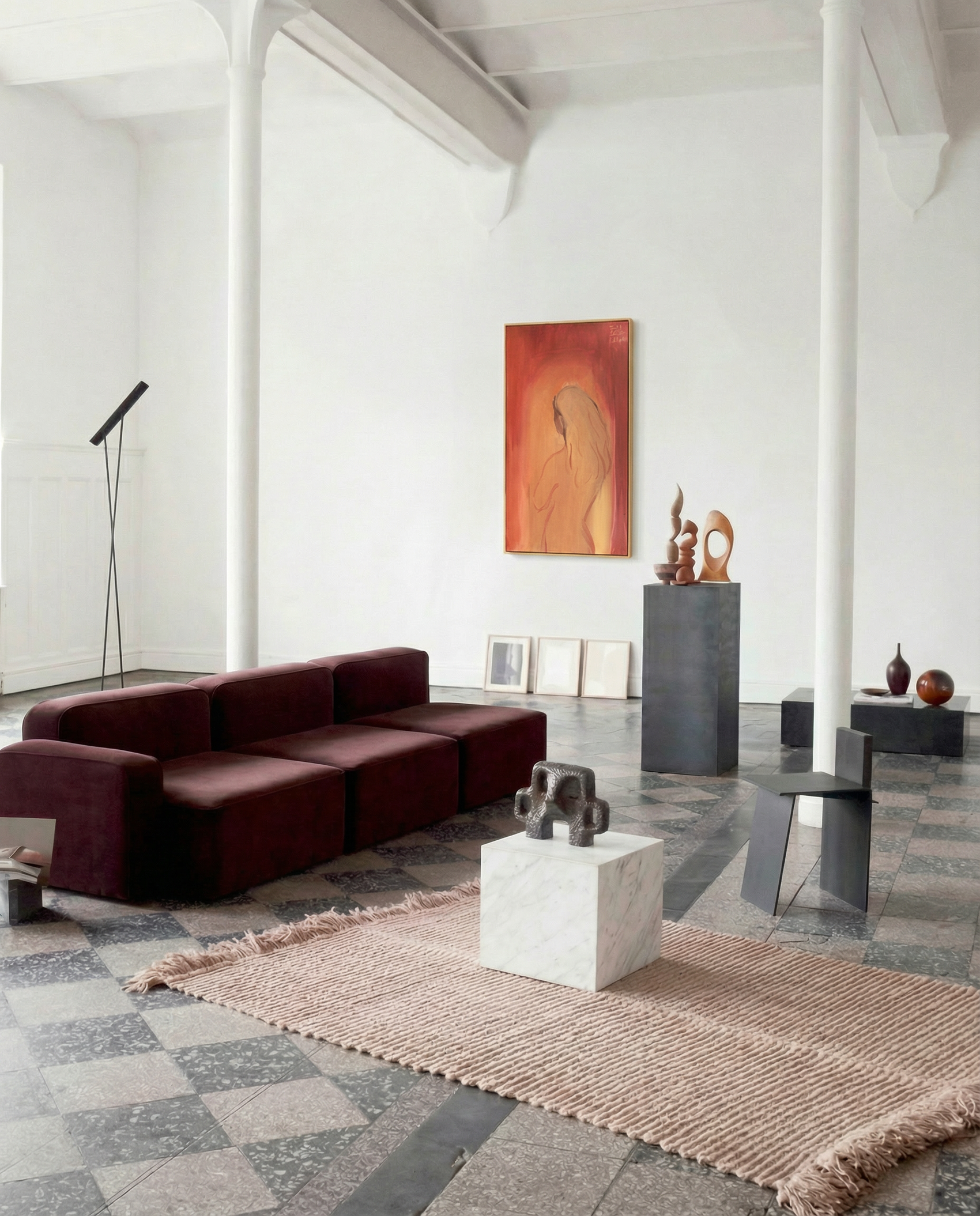 Modern living room with a dark brown sectional sofa, abstract art, and decorative items. Presence – Contemporary Figurative Canvas Print | Luxury Wall Art | Brume Art