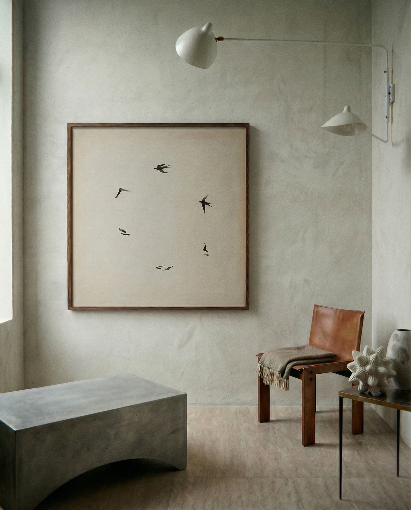 Modern interior with a framed artwork of birds on a neutral wall, a brown chair, and a concrete bench.  Birds – Nature Canvas Wall Art | Large Luxury Print | Brume Art