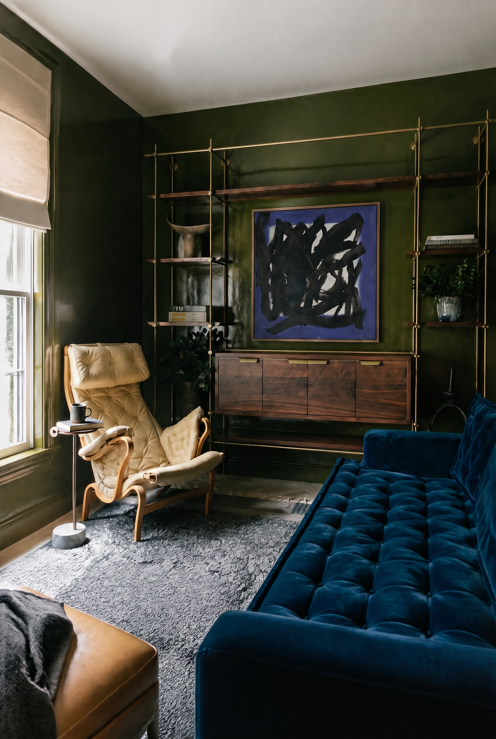 Modern living room with a blue sofa, beige armchair, and abstract painting on a green wall. Noise 5 – Bold Abstract Canvas Print | Large Luxury Wall Art | Brume Art