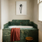 Bathroom with green marble vanity, white sink, and pink towel. Blossom – Botanical Canvas Wall Art | Large Luxury Print | Brume Art