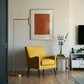 Modern living room with a yellow armchair, floor lamp, and abstract art on the wall. Presence 2 – Figurative Abstract Canvas | Premium Wall Art | Brume Art