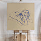 Blue ink drawing of a reclining figure on a beige canvas, mounted on a wooden easel against a white wall. Presence 3 – Figurative Abstract Canvas | Premium Wall Art | Brume Art | Luxury Wall Decor | Large Canvas Wall Art | Oversized Wall Hanging-Brume art