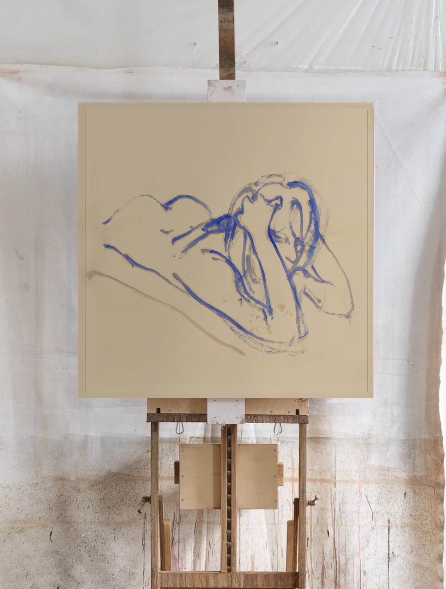 Blue ink drawing of a reclining figure on a beige canvas, mounted on a wooden easel against a white wall. Presence 3 – Figurative Abstract Canvas | Premium Wall Art | Brume Art | Luxury Wall Decor | Large Canvas Wall Art | Oversized Wall Hanging-Brume art