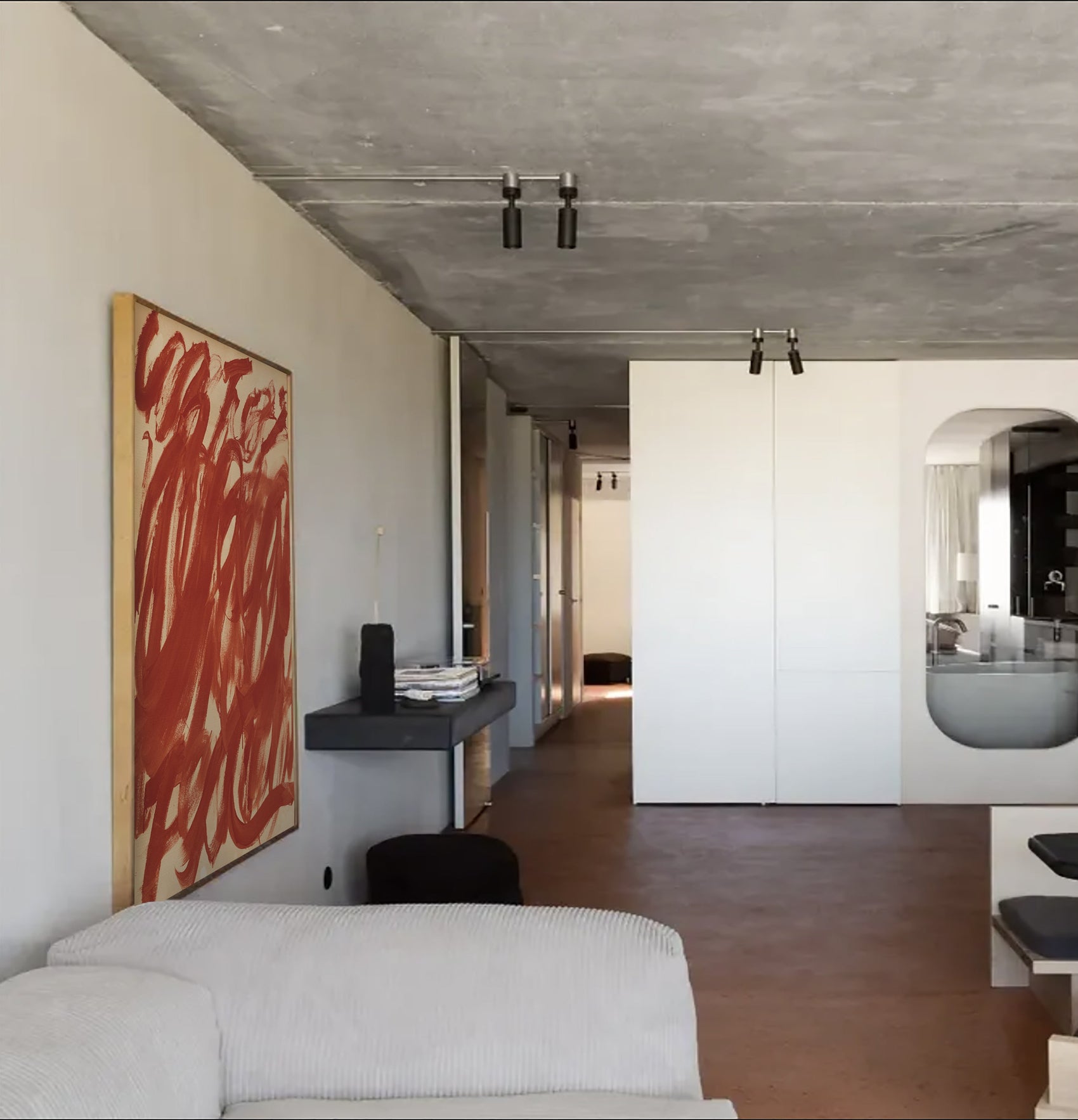 Modern interior with abstract red artwork on a white wall, white sofa, and concrete ceiling. Noise 6 – Textured Abstract Canvas Art | Premium Luxury Wall Decor | Brume Art