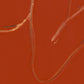 Close-up of a textured red surface with brown lines Presence 2 – Figurative Abstract Canvas | Premium Wall Art | Brume Art