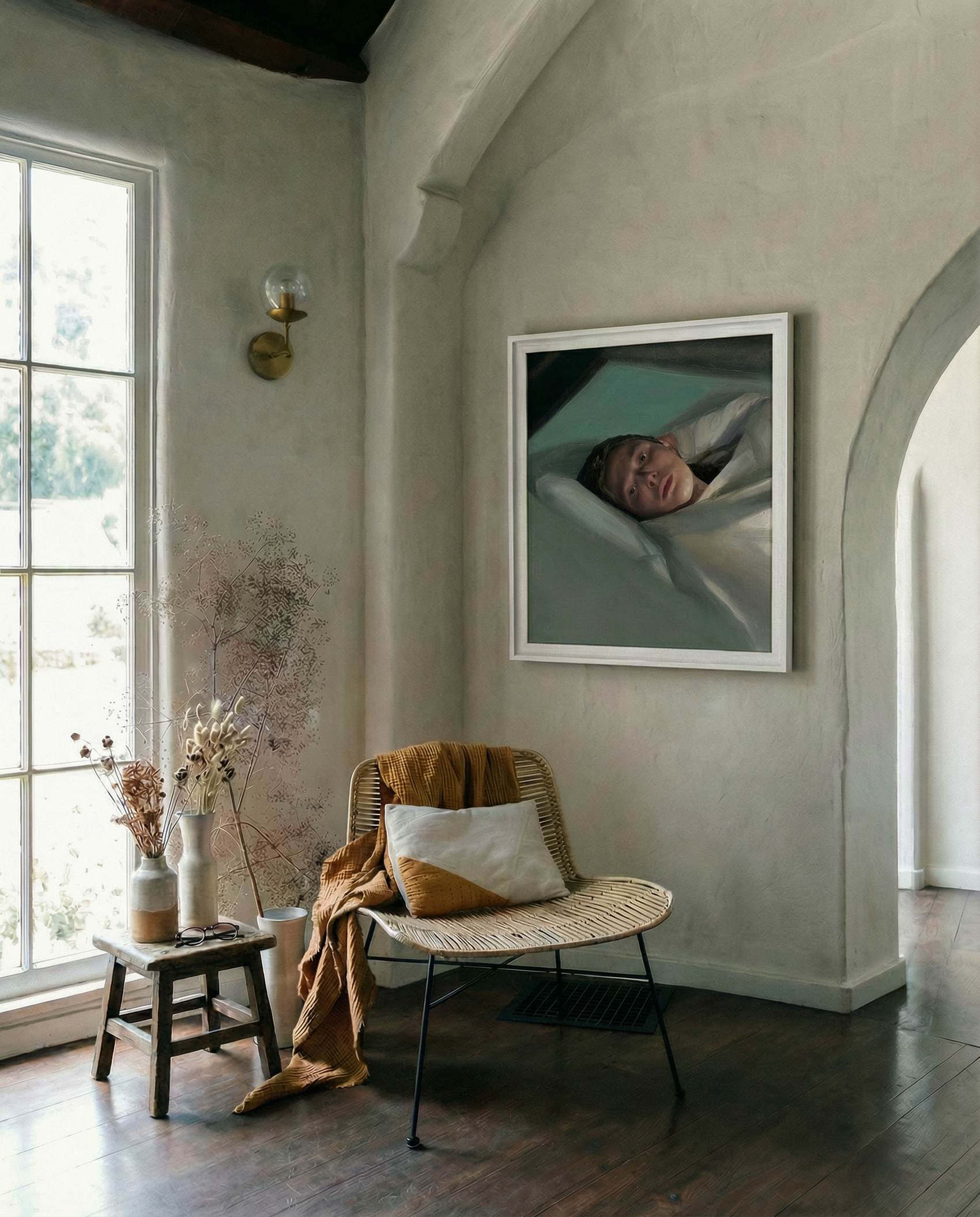 Cozy living room with a wicker chair, small table, and framed artwork on the wall. Gaze – Figurative Canvas Wall Art | Premium Luxury Print | Brume Art | Luxury Wall Decor | Large Canvas Wall Art | Oversized Wall Hanging-Brume art