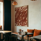 Cozy interior of a restaurant with abstract art, wooden tables, and chairs. Noise 6 – Textured Abstract Canvas Art | Premium Luxury Wall Decor | Brume Art